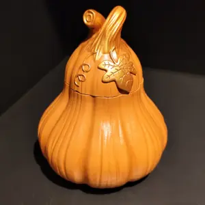 Свічка в кашпо помаранчева Гарбуз 300 гр